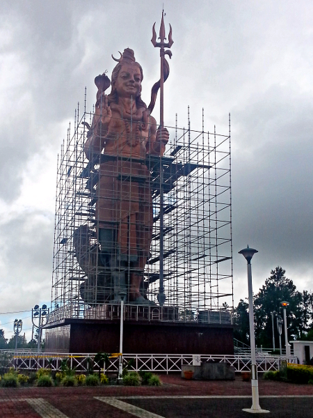 The Shiva statue at Grand Bassin getting a touch up.