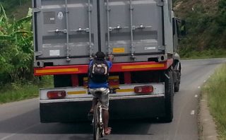 Truck And Bicycle on RN2 in Madagascar