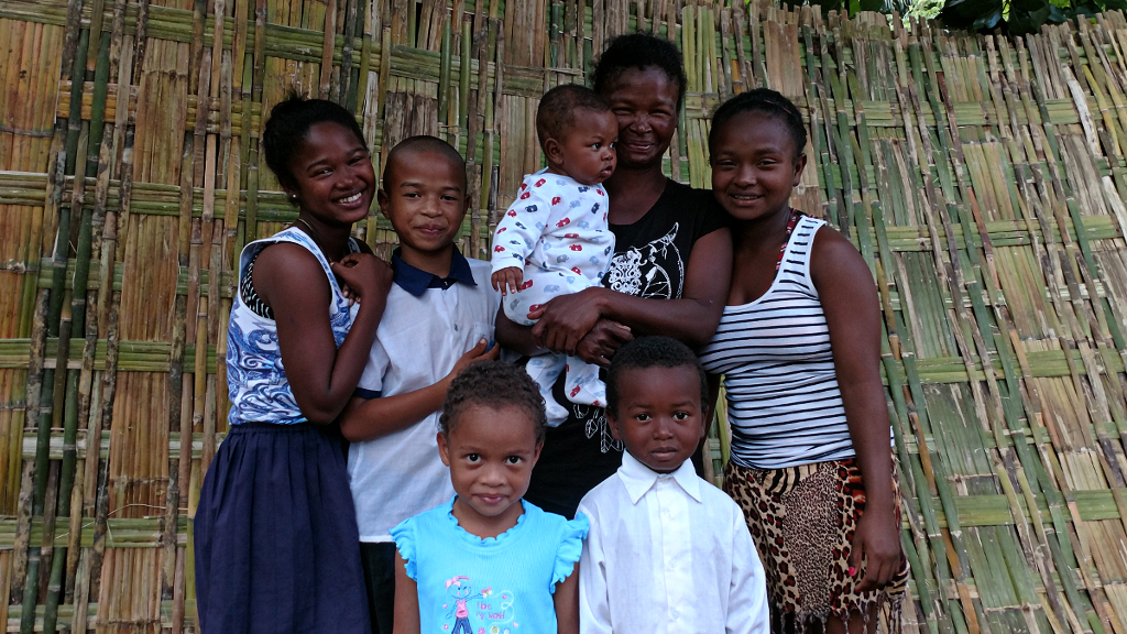 Germaine's family (clockwise from top left): Mariah, 16 years, James, 12, Claudino, 4 months (her brother's son), Germaine, Marcelline, 18, Gayëthan, 6, and Gayëthan's friend, Cynthia, 5, who happened to be playing at Germaine's home when I visited.